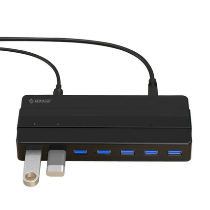 Orico 7-Port USB 3.0 Hub for Expanding Desktop Connections — black desktop hub with 7 USB 3.0 ports and two flash drives connected
