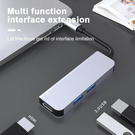 Compact USB-C Docking Station for Expanding Laptop Ports connected to a laptop with HDMI and USB devices