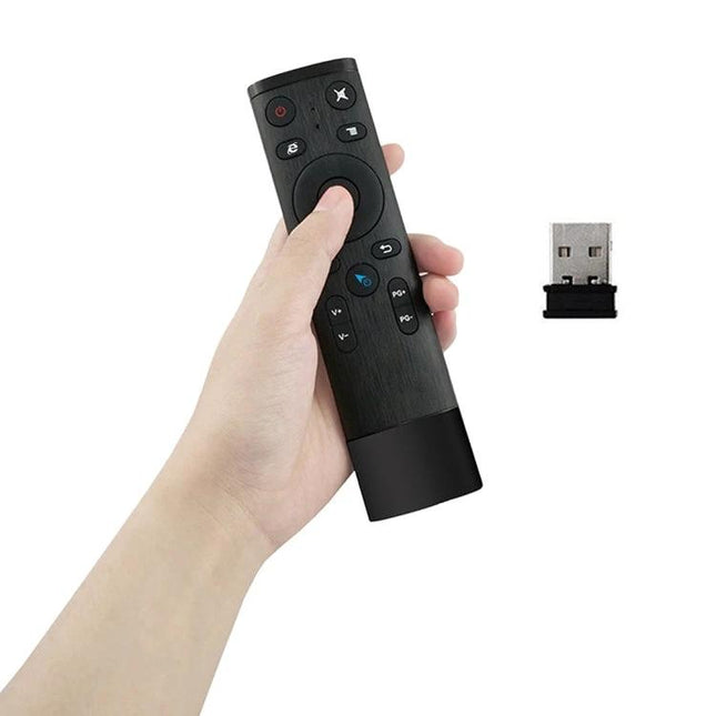 Universal 3D Air Mouse Remote Controller for Smart TVs and Computers in hand with USB dongle showing gesture navigation and compact design