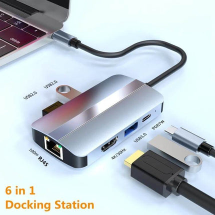 BYL 6-In-1 USB-C Docking Station for Multiple Ports connected to a laptop showing HDMI, USB-A, RJ45 and USB-C ports