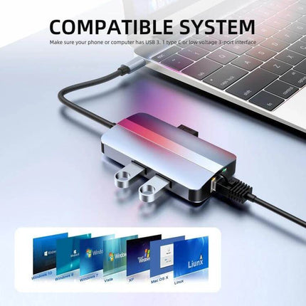 BYL 6-In-1 USB-C Docking Station for Multiple Ports connected to a laptop, showing multiple peripheral and Ethernet connections