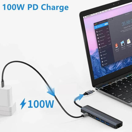 BYL USB-C Multi-Port Docking Station with Ethernet Adapter connected to laptop showing 100W PD charging and multiple USB ports