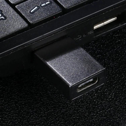 Aluminum USB 3.0 Adapter for Type-C Device Connections plugged into laptop USB port for fast file transfers and peripheral compatibility