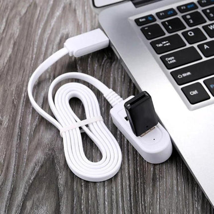 Compact USB Hub for Everyday Device Connections at Home and Travel — white 3‑port hub connected to laptop with flash drive and charging cable