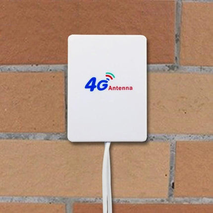 4G LTE Antenna with SMA Male Connector for Signal Boosting on Routers mounted flat-panel antenna on brick wall for improved 4G reception