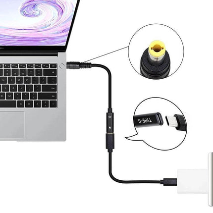 USB-C to 5.5 x 2.5mm Charger Cable for Portable Device Powering connected between USB-C power source and laptop, compact 17.5cm, lightweight 10g