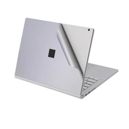 Protective Film Sticker Set for Microsoft Surface Book 2 15-Inch applied on silver Surface Book 2 back to prevent scratches and maintain touch sensitivity
