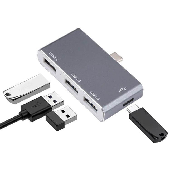 Compact Portable USB-C 4-Port Hub for Laptop Connectivity with USB 3.0 and USB 2.0 ports and connected flash drives