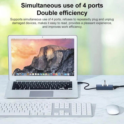 RDS USB-C Hub Adapter with USB 3.0 and Three USB 2.0 Ports connected to laptop with keyboard and mouse for simultaneous use of four ports