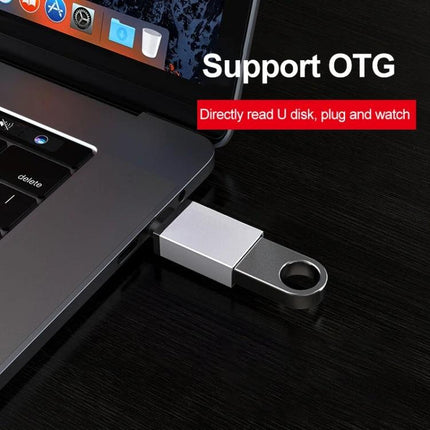 Daily Adapter for Phone Charging and Data Transfer plugged into laptop showing OTG USB file transfer and charging, compact Type-C adapter for everyday use