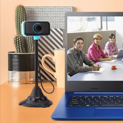 Webcam with Built-in Microphone for Desktop and Laptop Use on stand beside laptop showing video call