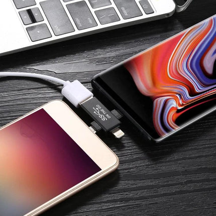 Versatile USB OTG Adapter for Daily Phone and Tablet Use - USB flash drive connected to two phones for plug-and-play file access