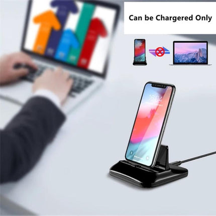 Versatile Magnetic Base for Charging Devices at Home Daily showing smartphone on a 3-connector magnetic charging dock on a desk