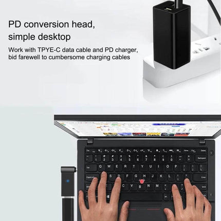 100W USB-C to DC Charging Adapter for Dell Devices shown plugged into power strip charging a laptop for travel and compact desk use