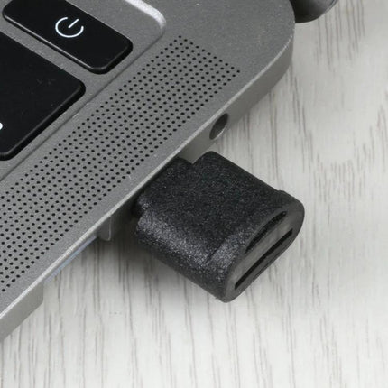 Compact USB-C Adapter for Daily TF Card Access on Devices plugged into laptop USB-C port for quick TF card transfers