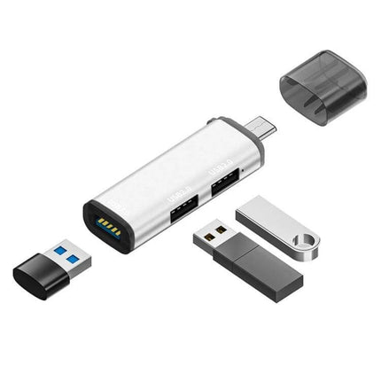 3-in-1 USB-C Hub Docking Station for Device Connections showing three USB ports with multiple flash drives attached