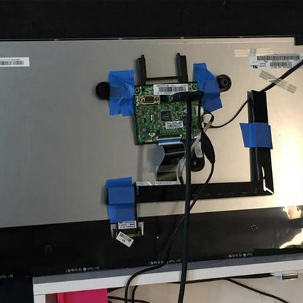 BASEQI Protective Hidden TF Card Case for Raspberry Pi mounted behind display with Raspberry Pi board and cables, low-profile hidden TF card storage.