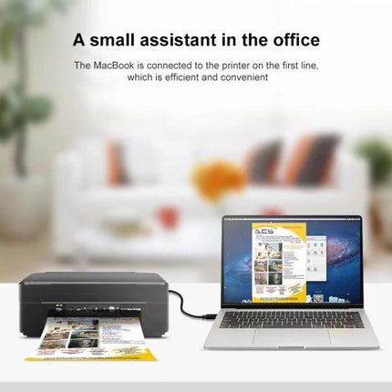 USB-C Cable for Everyday Home and Work Device Links connecting laptop to printer for charging and fast data transfer in a tidy home office