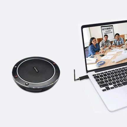 YANS Wireless Omnidirectional Microphone for Video Conferences placed beside a laptop showing a meeting, 360° pickup for clear remote-conference audio