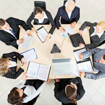 YANS Omnidirectional Microphone for Video Conference Calls placed on conference table capturing clear hands-free audio from participants during a business meeting