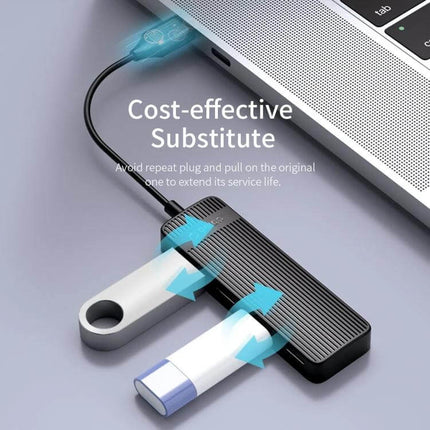 Orico 4-Port USB 2.0 Hub for Connecting Multiple Devices Easily - black hub connected to laptop with two USB drives plugged in