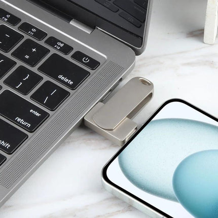 Versatile USB Drive for Daily File Storage and Transfer plugged between a laptop and smartphone for quick photo and document transfer