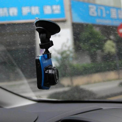 Car Camcorder with 2.4 Inch LCD Screen for Driving Recordings mounted on windshield capturing road footage