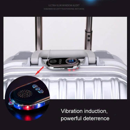 Vibration Security Alarm for Home and Vehicle Protection compact vibration detector on suitcase handle with LED lights and audible alert