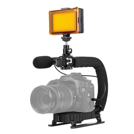 Portable Handheld Camera Stabilizer Kit with LED Light and Mic mounted on DSLR with microphone and amber LED light for vlogging