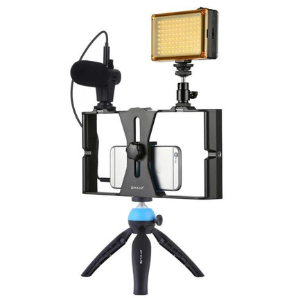 Puluz 4-in-1 LED Selfie Light Kit for Smartphone Vlogging mounted on mini tripod with LED light and microphone for vlogging