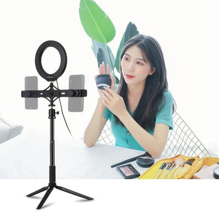 PULUZ Kit for Everyday Live Streaming and Vlogging showing ring light, phone holder, tripod and woman vlogging makeup