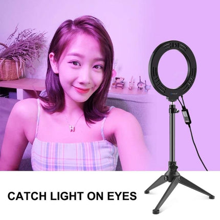 PULUZ Ring Light for Daily Video Calls and Home Photos showing woman taking lit selfie with tabletop tripod ring light