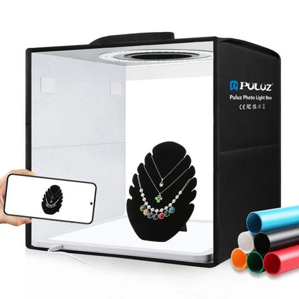 PULUZ 30cm Folding Ring Light for Small Product Photography shown in a portable photo light box shooting jewelry