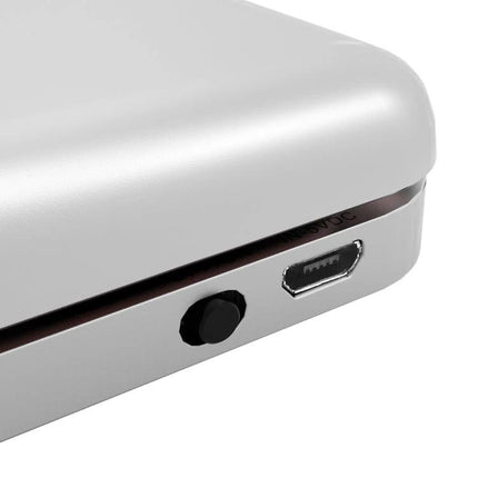 Ultra-Thin Bluetooth Keyboard Case for iPad 9.7 Inch Models showing silver corner with micro USB charging port and power switch