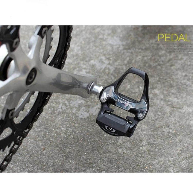 PROMEND Black Self-Locking Road Bike Pedal for Daily Riding mounted on crank arm showing aluminum body and self-locking mechanism