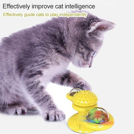 Versatile Cat Toy for Daily Home Play and Scratching showing kitten batting a yellow suction-base windmill toy for interactive play and scratching