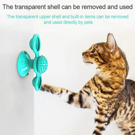 Versatile Cat Toy for Daily Home Play and Scratching suction-cup windmill toy on wall with cat pawing at textured scratching surface