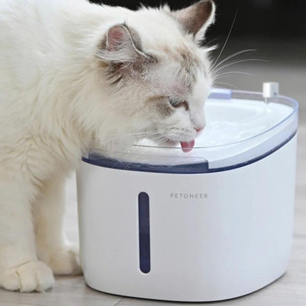 Keep Your Pet's Water Fresh with Xiaomi Youpin Home Filters - white cat drinking from modern pet water fountain with filter