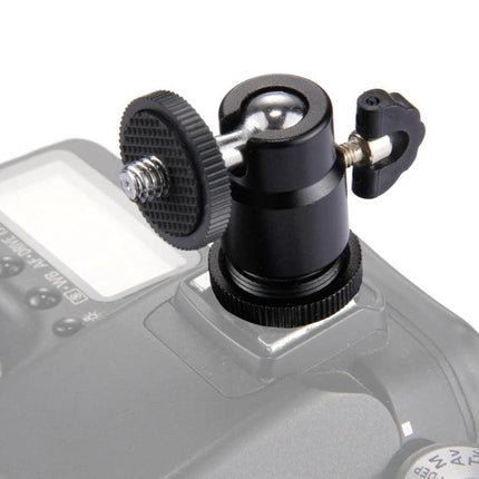 PULUZ Adjustable Tripod Ball Head for Camera Positioning mounted on camera hot shoe showing ball joint and single knob for tilt and rotation