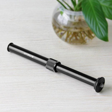 PULUZ Adjustable Metal Handheld Tripod Mount for DSLR and SLR Cameras shown extended on table with black metal finish