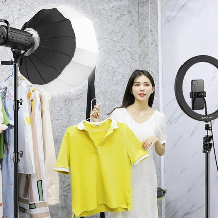 PULUZ 65cm Foldable Lantern Softbox Light Diffuser for Photography in studio lighting setup with model holding yellow shirt