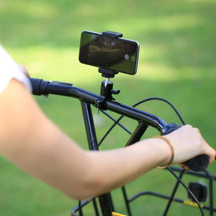 PULUZ Universal Smartphone Clamp for Tripods and Selfie Sticks mounted on bicycle handlebar for steady mobile video and photos