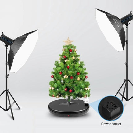 PULUZ 45cm Black Rotating Display Stand For Showcasing Items showing a decorated Christmas tree on a black 360° display platform