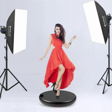 PULUZ 45cm Black Rotating Display Stand For Showcasing Items showcasing model in red dress under studio lights