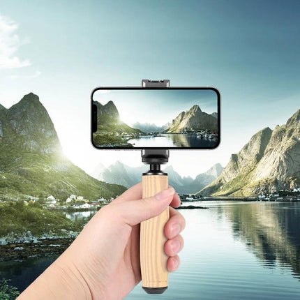 PULUZ Camera Grip Stabilizer for Handheld Video Shooting showing handheld metal grip with anti-slip sponge holding smartphone over lake scenery