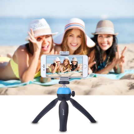 PULUZ Universal Aluminum Phone Clamp Holder with Cold Shoe Mount securing smartphone on tripod for beach vlog and stable group selfie