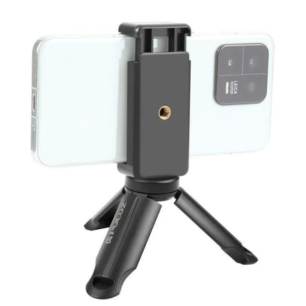 Portable Mini Tripod with Clamp for Smartphone Stability holding phone for hands-free selfies and vlogging, compact travel tripod