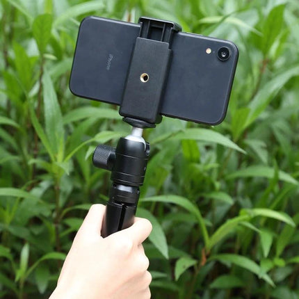 PULUZ Compact Metal Desktop Tripod for Travel Photography with smartphone mounted for handheld low-angle shots