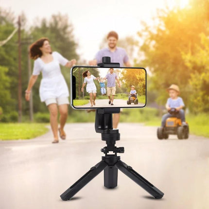 PULUZ 360-Degree Rotating Universal Phone Clamp Holder for Smartphones mounted on tripod capturing family video in park, portrait to landscape rotation