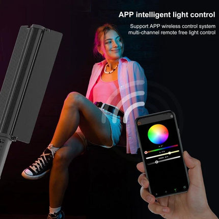 PULUZ Handheld Color Fill Light for Photography Sessions shown controlling color via smartphone app on model in studio